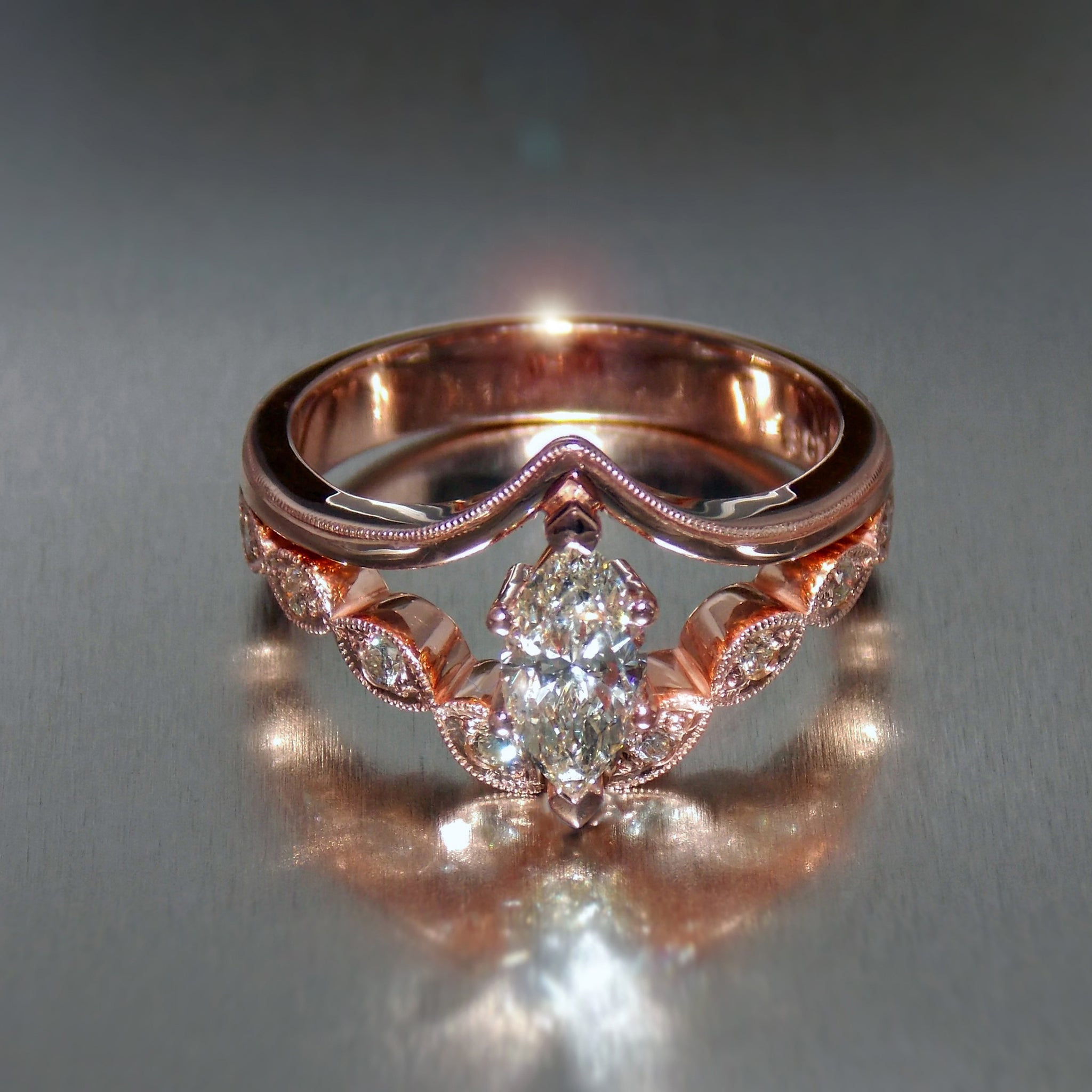 Marquise cut diamond engagement ring set in 9K rose gold