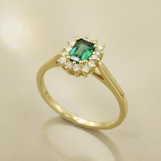Emerald and diamond halo