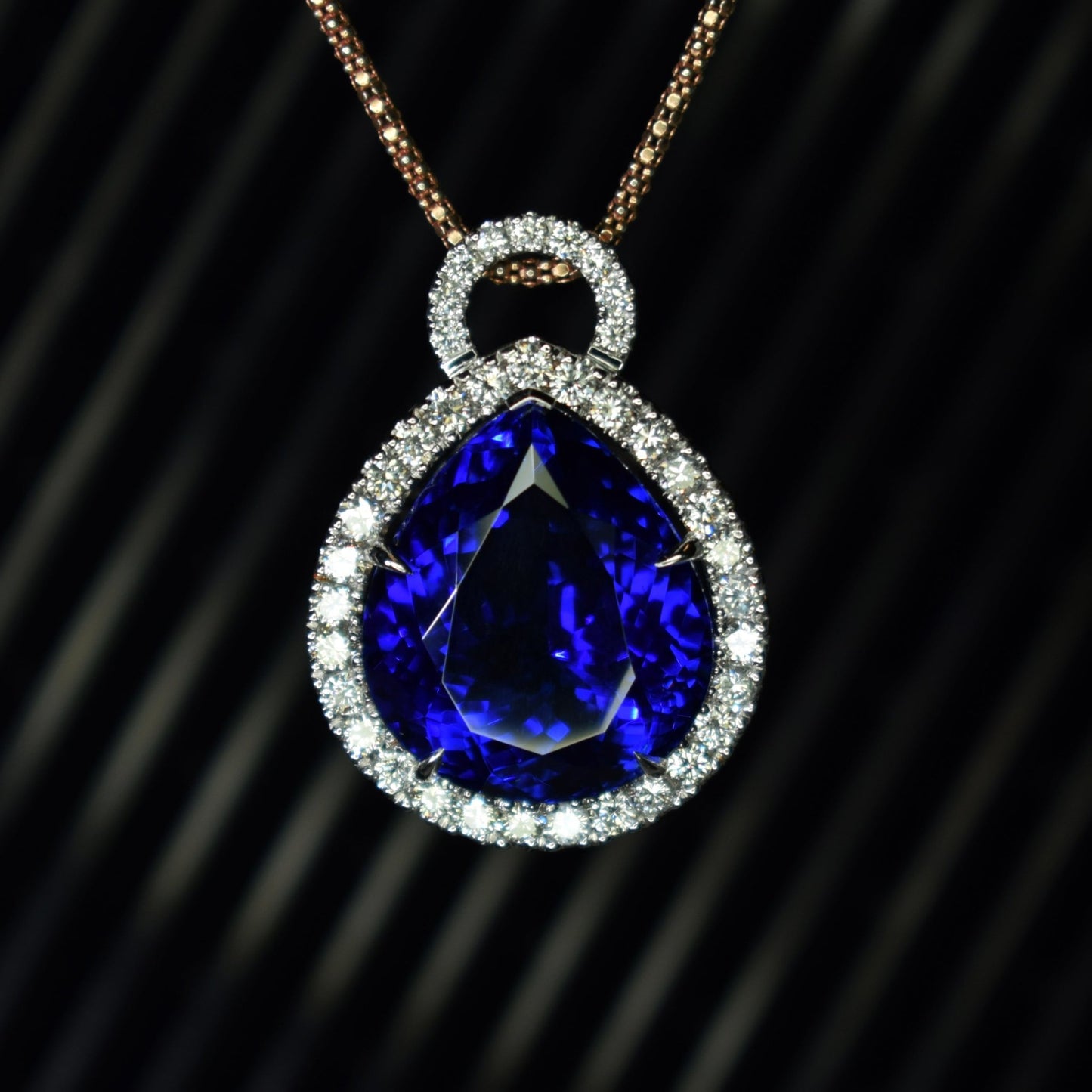18ct white gold and tanzanite pendant with diamond halo - Scherman's - Pendants - Scherman's