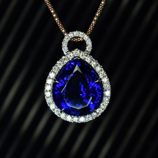 18ct white gold and tanzanite pendant with diamond halo - Scherman's - Pendants - Scherman's