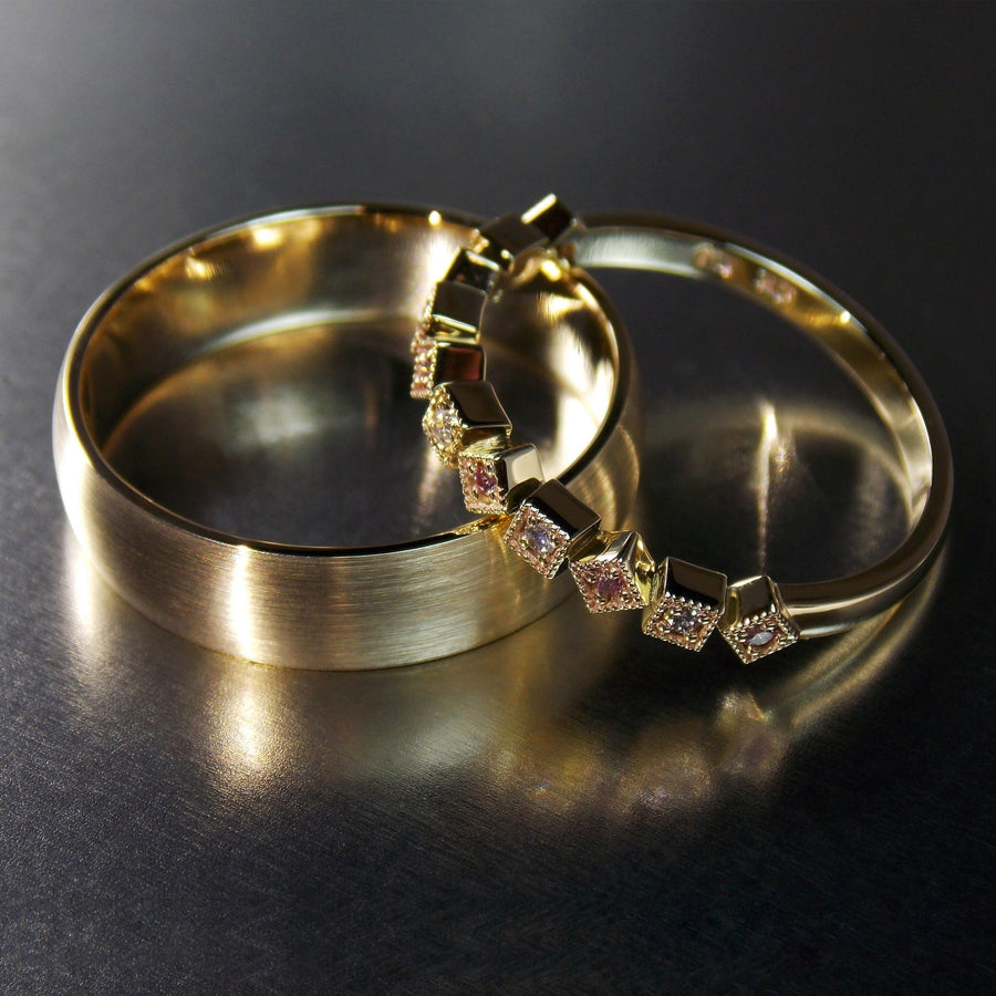 9ct yellow gold men's and ladies wedding bands. Ladies band set with white and pink diamonds