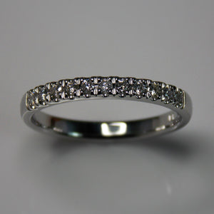 White gold and diamond half eternity band