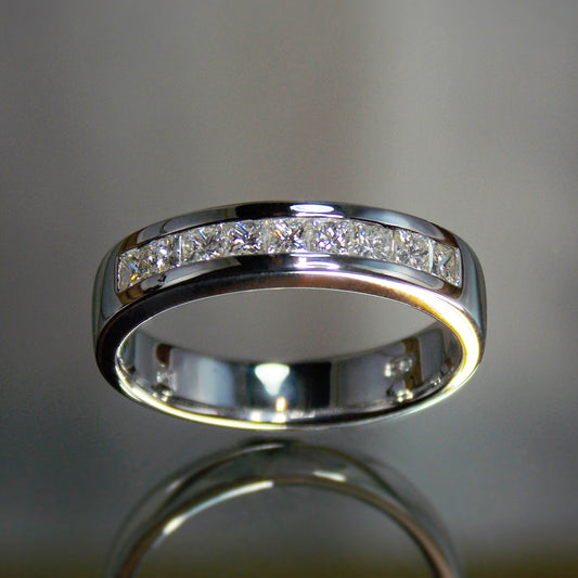 Princess cut diamond channel band in platinum