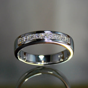 Princess cut diamond channel band in platinum