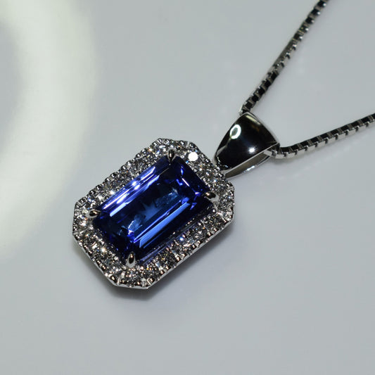 Emerald cut tanzanite and diamond halo set in 18ct white gold - Scherman's - Pendants - Scherman's